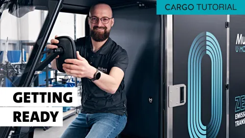 David Feldmann sits in the cargo bike