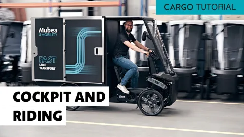 David Feldmann sits in the moving cargo